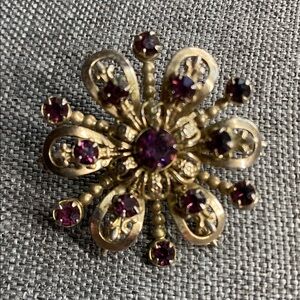 Vintage Goldish Tone Purple Rhinestone Starburst Flower Brooch